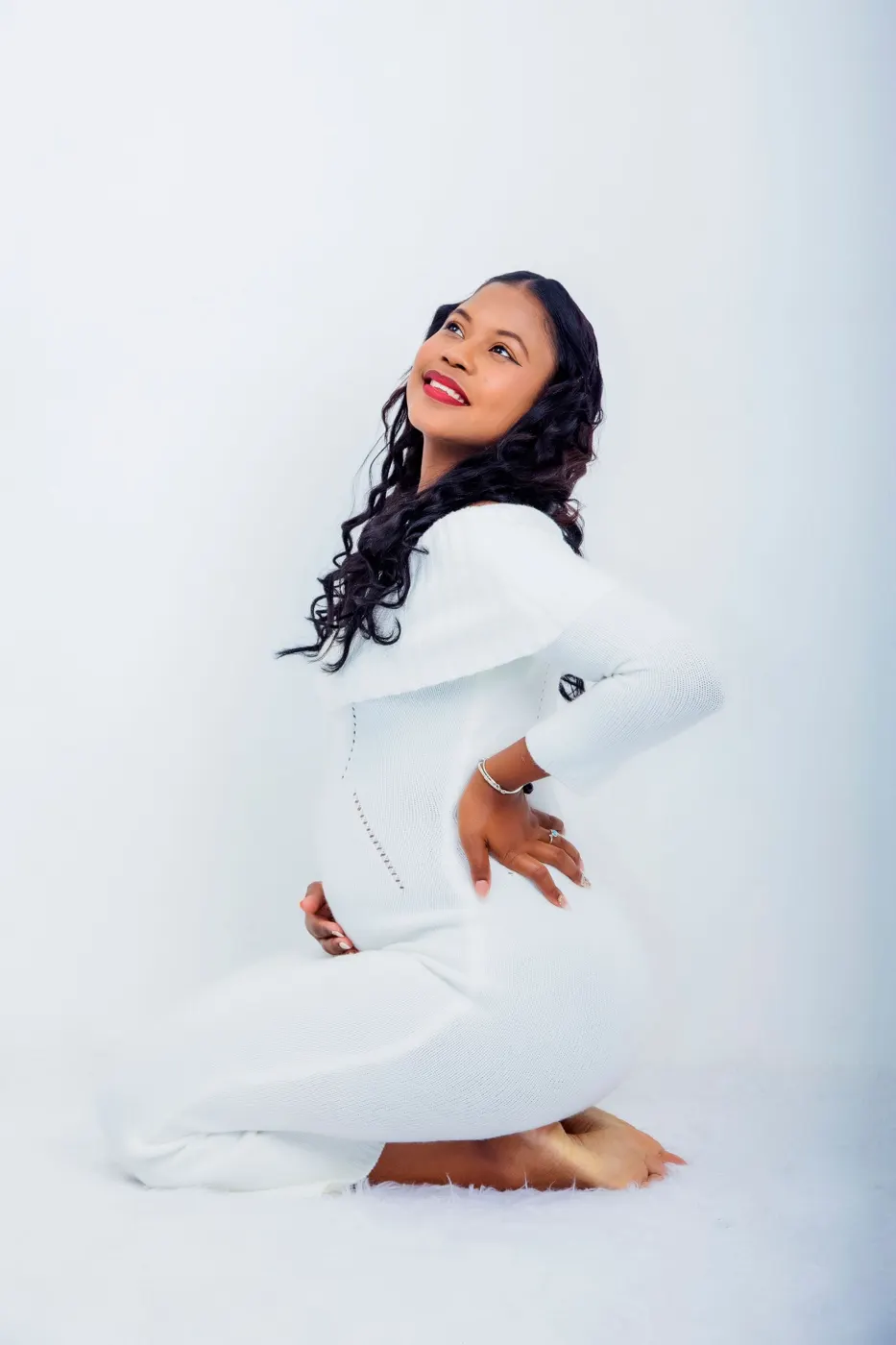 Pregnant woman in white