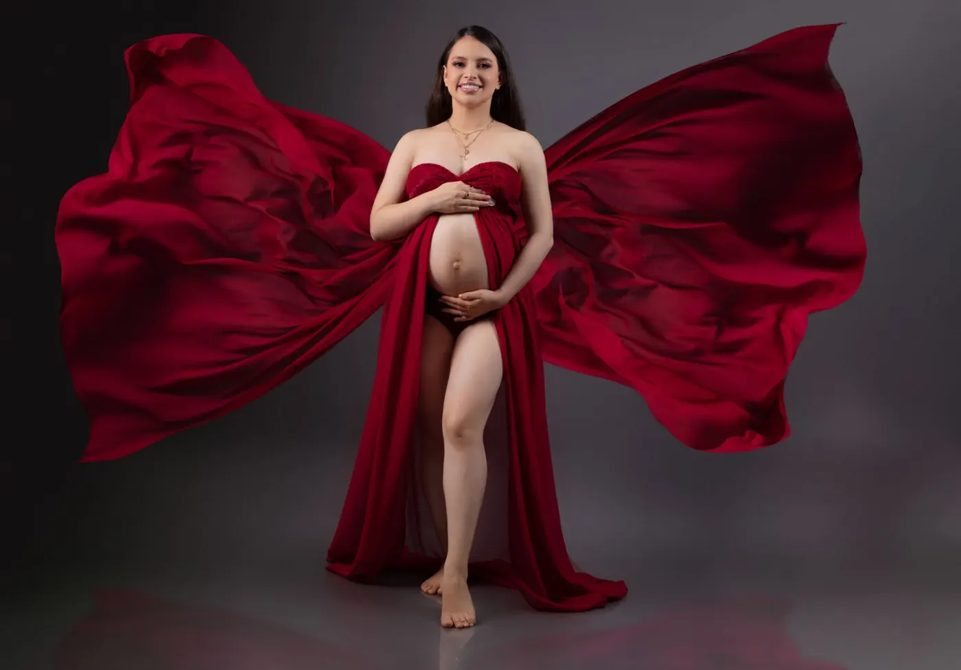 Pregnant woman in a red gown